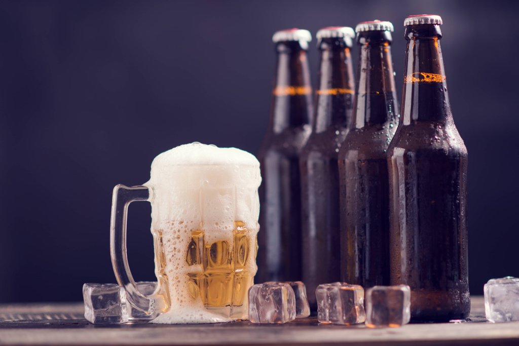 glass-bottles-beer-with-glass-ice-dark-background-min.jpg